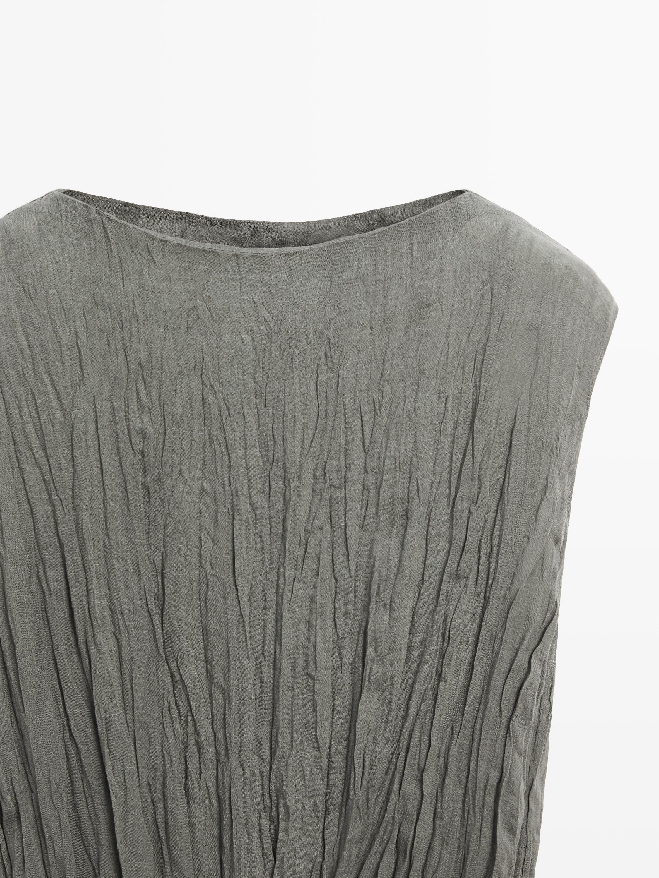 Textured flowing fabric dress with sash belt